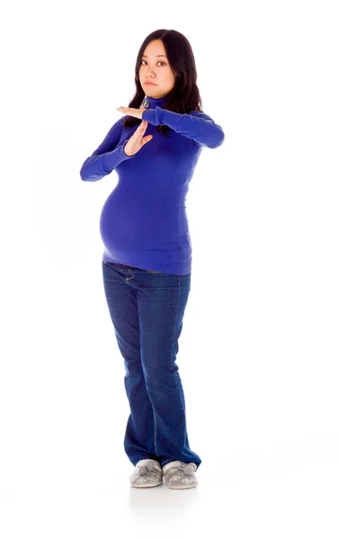 Pregnant woman gesturing break sign — Stock Photo, Image