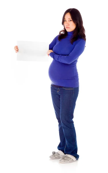 Pregnant woman holding blank sign — Stock Photo, Image