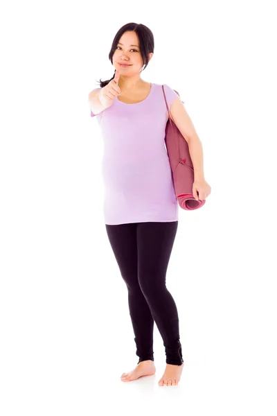 Gravid kvinna gestikulerande tummen upp skylt — Stockfoto