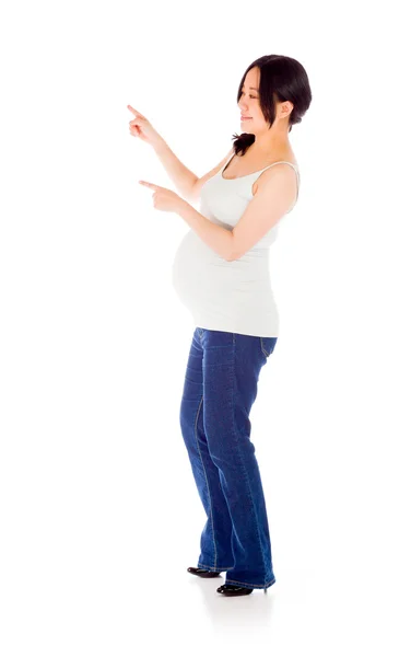 Pregnant woman pointing left — Stock Photo, Image