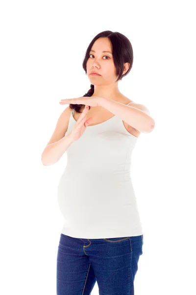 Беременная женщина жест брейк-знак — стоковое фото