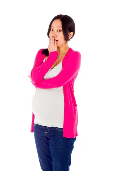 Pregnant woman covering mouth because of  mistake — Stock Photo, Image