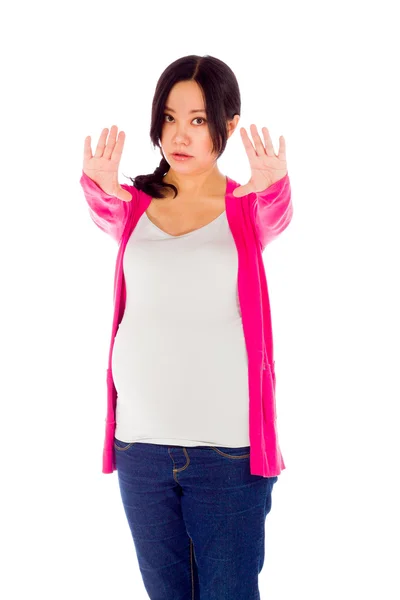 Femme enceinte gestuelle stop signe — Photo