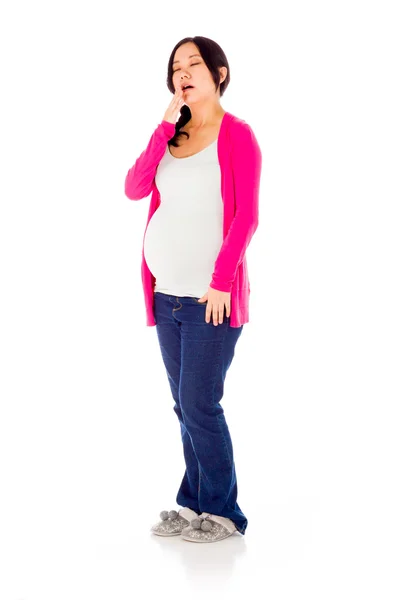 Беременная женщина устала и зевает — стоковое фото