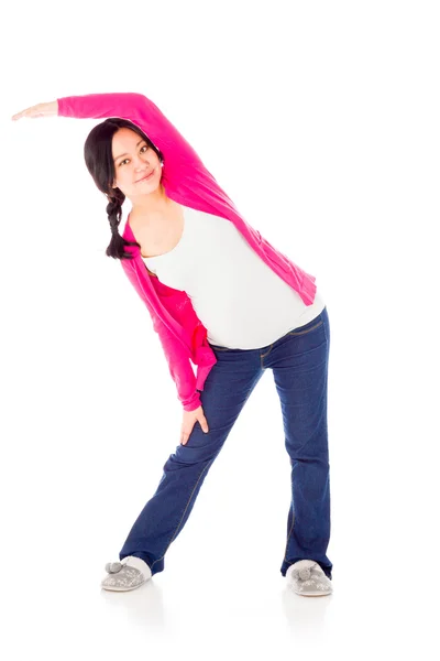 Pregnant woman stretching — Stock Photo, Image