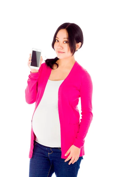 Kobieta w ciąży pokazuje telefon komórkowy — Zdjęcie stockowe