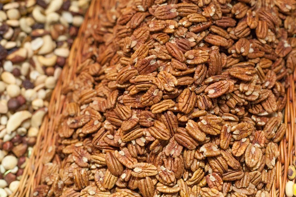 Pecan peanuts on sale at a market stall, La Boqueria Market, Barcelona, Catalonia, Spain — Stock Photo, Image