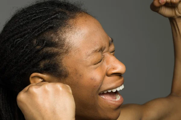 Model cheerful with fists up — Stock Photo, Image