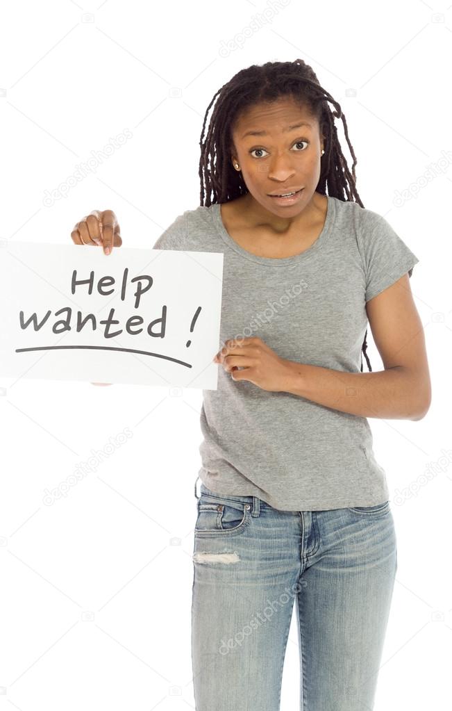 Model holds Help Wanted sign