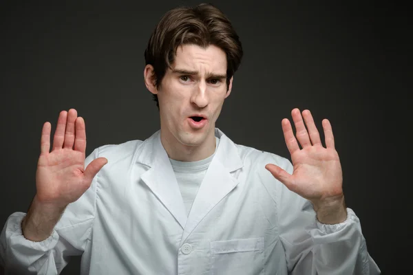 Model gesturing stop sign with hands — Stock Photo, Image