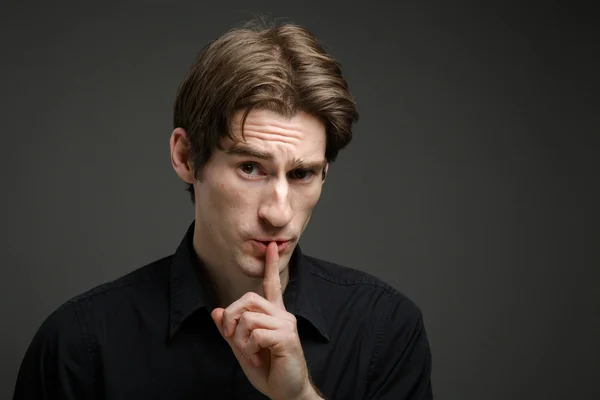 Model with finger on lips — Stock Photo, Image