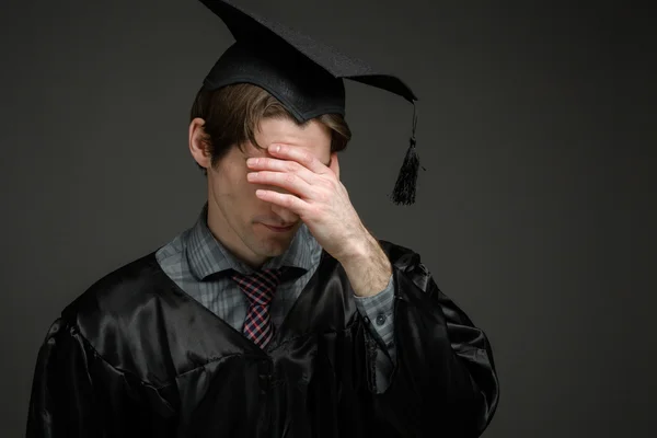 Model ashamed hiding face in hand — Stock Photo, Image