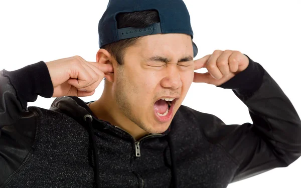 Model plugging ears with fingers — Stock Photo, Image