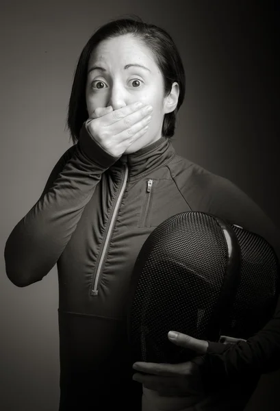 Fencer with hand over her mouth — Stock Photo, Image