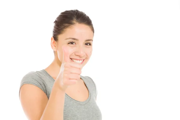 Model gesturing thumb up sign — Stock Photo, Image