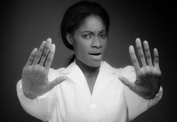 Model gesturing stop sign with hands — Stock Photo, Image