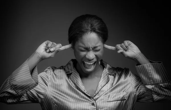 Model plugging ears — Stock Photo, Image