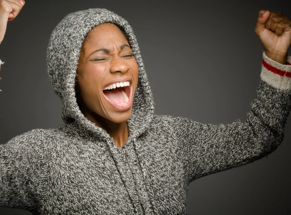 Happy model with arms in the air — Stock Photo, Image