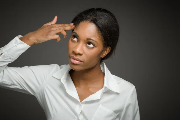 Model in despair with hand gun — Stock Photo, Image