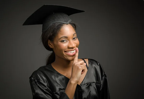 Model met een vinger op lippen — Stockfoto