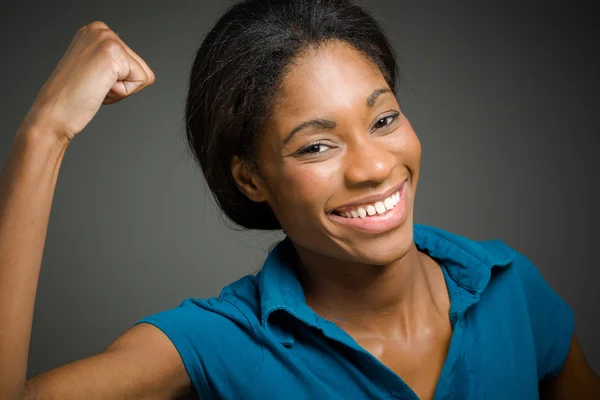 Model shows strength in arm curl — Stock Photo, Image