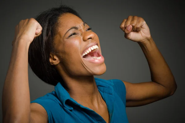 Happy model with arms in the air — Stock Photo, Image