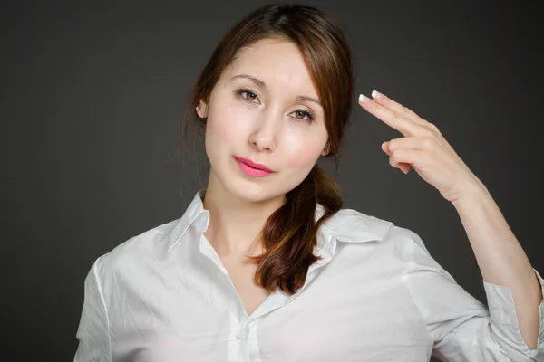 Modelo en desesperación con pistola de mano — Foto de Stock