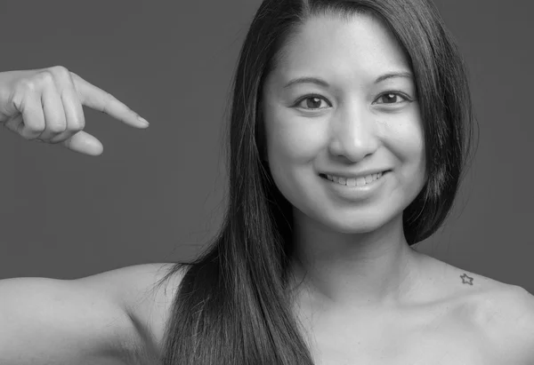 Model pointing to herself — Stock Photo, Image