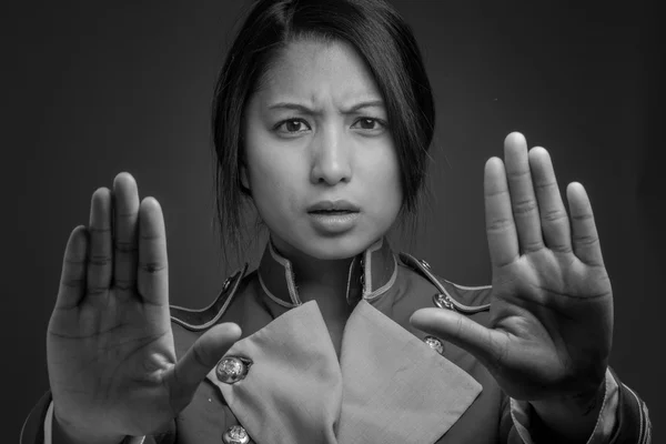 Model gesturing stop sign with hands — Stock Photo, Image