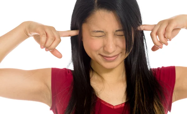 Model plugging ears by fingers — Stock Photo, Image