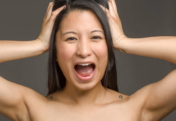 Stressed model pulling hairs — Stock Photo, Image