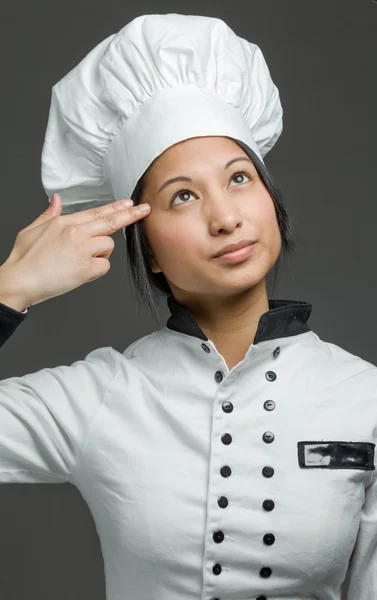 Model in despair with hand gun — Stock Photo, Image