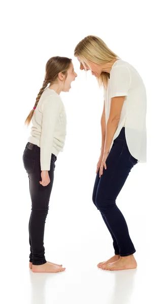 Mother and daughter screaming to each other — Stock Photo, Image