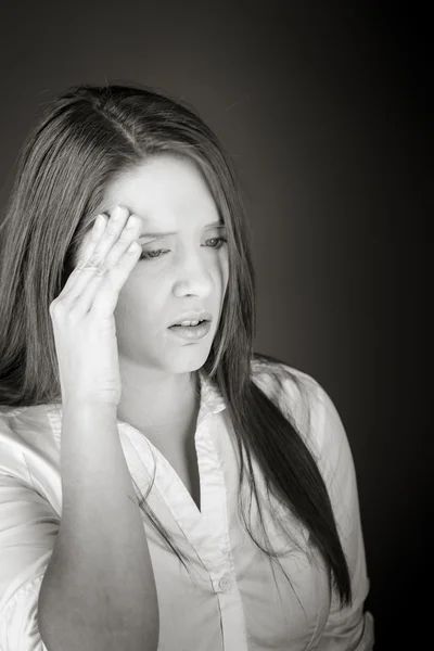 Model suffers from confused headache — Stock Photo, Image