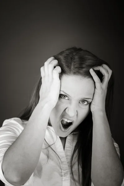 Stressed model pulling hairs — Stock Photo, Image