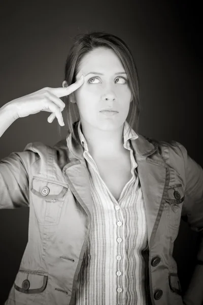 Model in despair with hand gun — Stock Photo, Image