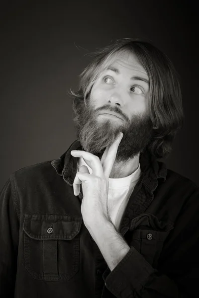 Model thinking with hand under chin — Stock Photo, Image