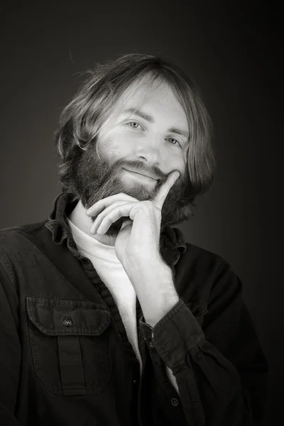 Model thinking with hand under chin — Stock Photo, Image