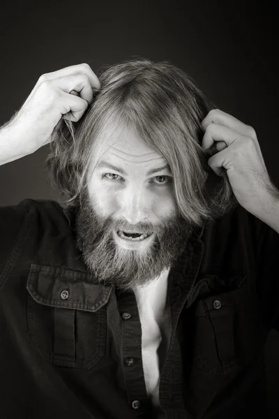 Stressed model pulling hairs — Stock Photo, Image