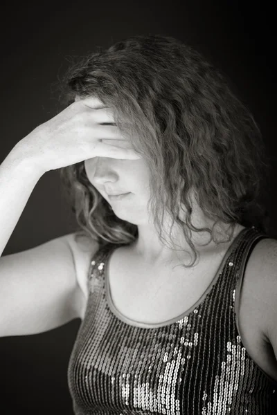 Model ashamed hiding face in hand — Stock Photo, Image