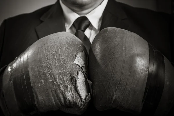 Man in boxer gloves ready to fight — Stock Photo, Image