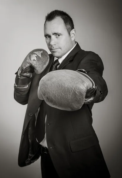 Man in boxer gloves ready to fight — Stock Photo, Image