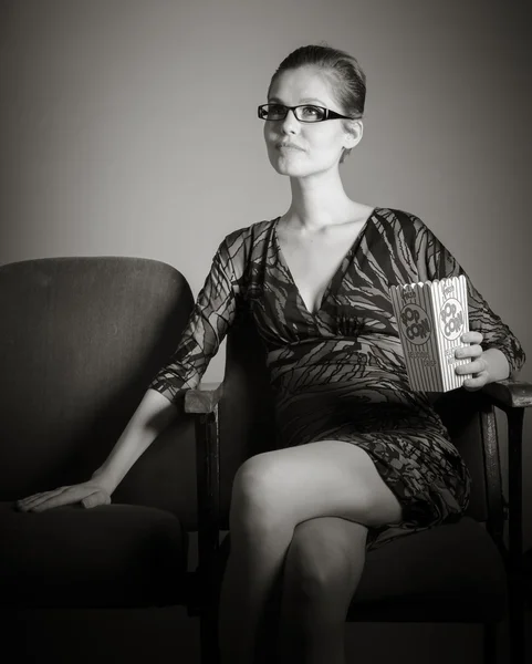 Woman watching movie at the cinema — Stock Photo, Image