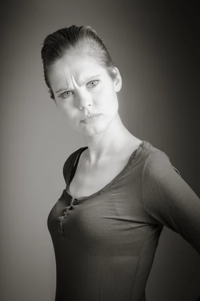 Angry woman looking at camera — Stock Photo, Image