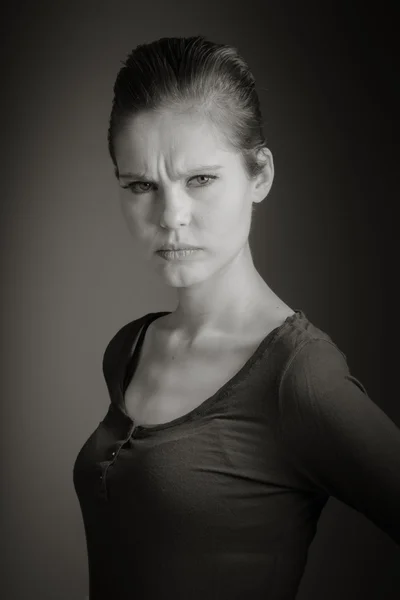 Angry woman looking at camera — Stock Photo, Image