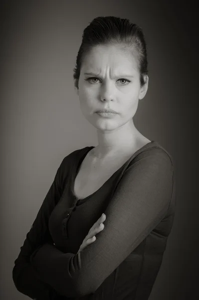Angry woman with crossed hands — Stock Photo, Image