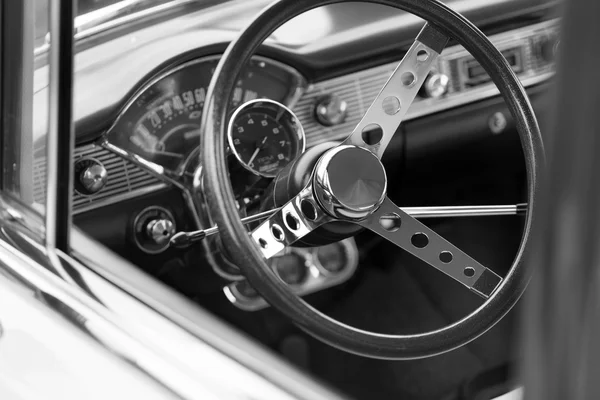 Black steering wheel of a classic car — Stock Photo, Image