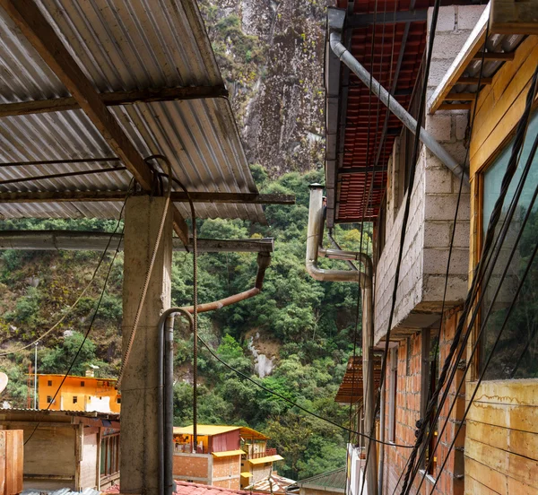 Houses at beneath of mountain, Machu Picchu