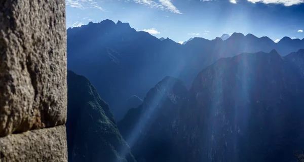 Sun rays seen over the mountains — Stock Photo, Image