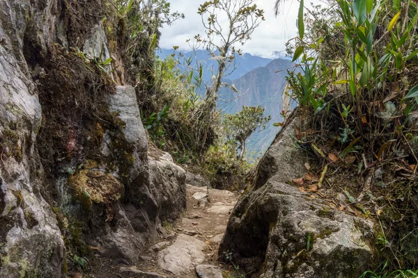 Remote mountain viewed through cliff — Stock Photo, Image